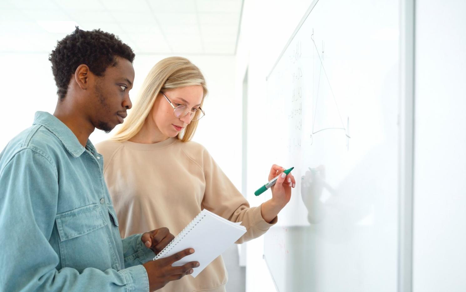 Strategic business planning session with documents spread on conference table