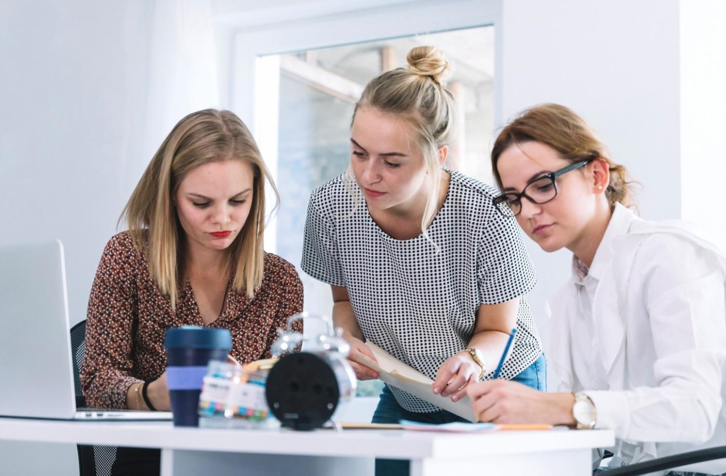 Professional consultation meeting with handshake between business advisor and client